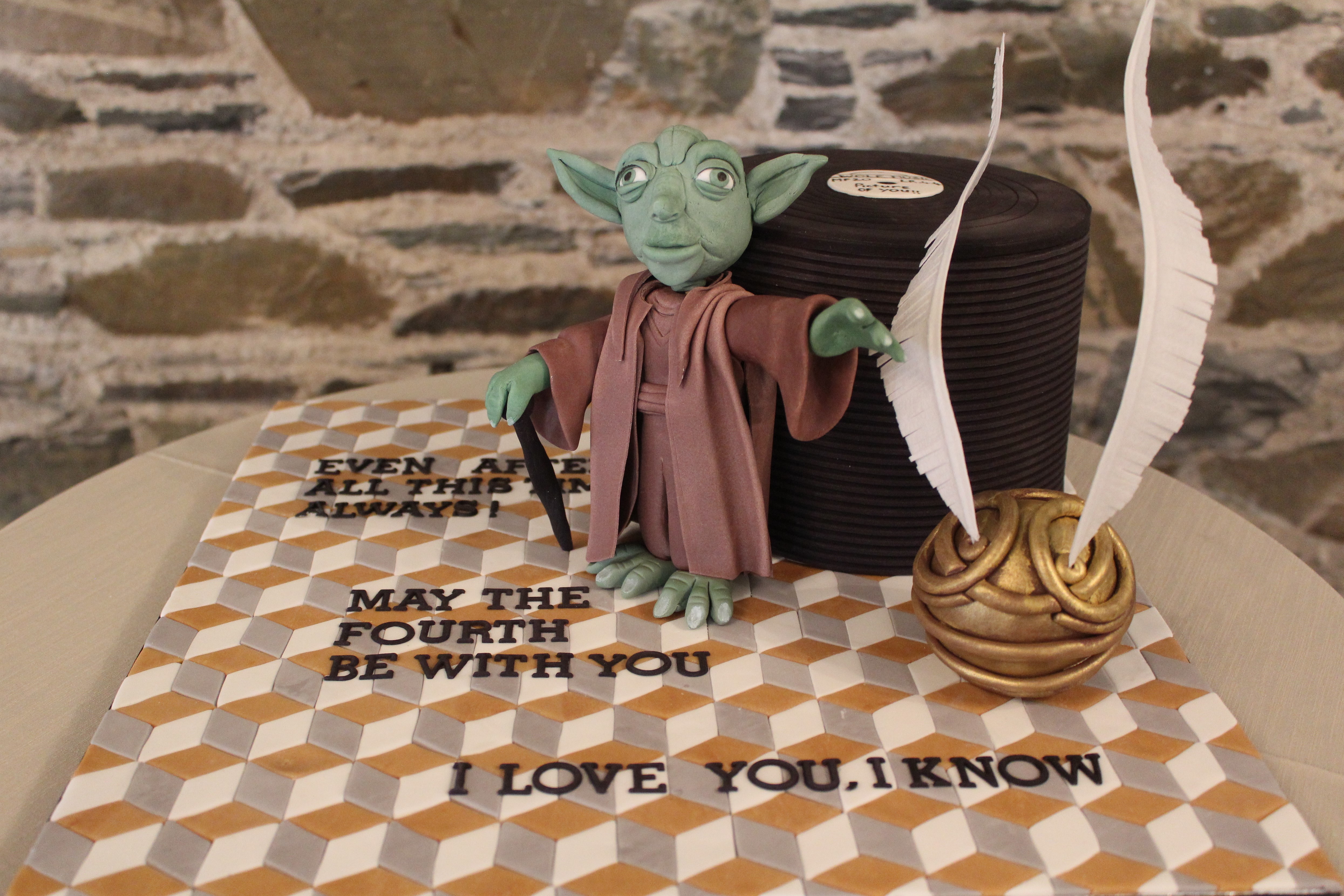 Groom's cake reflecting his interest in Star Wars, Harry Potter, and recorded music